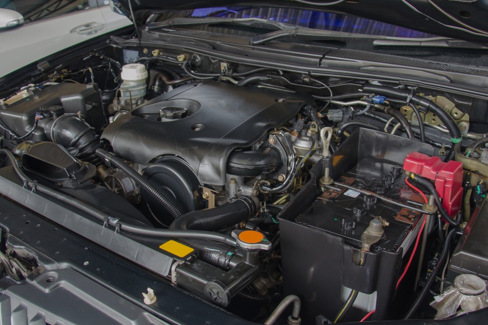 Engine Repair in Waupaca WI At Little Wolf Automotive. close-up view of a vehicle engine during diagnostics and tune-up at an auto repair shop
