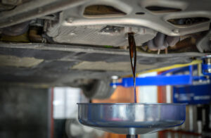 Transmission Flush in Rothschild, WI At Eagle Express Lube. Close-up of transmission fluid being flushed