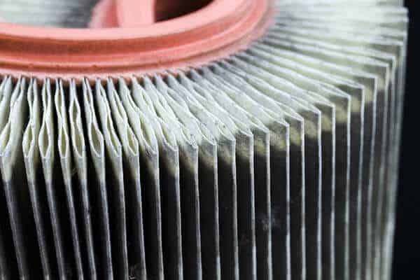 engine air filter replacement | Little Wolf Automotive, close up of dirty air filter