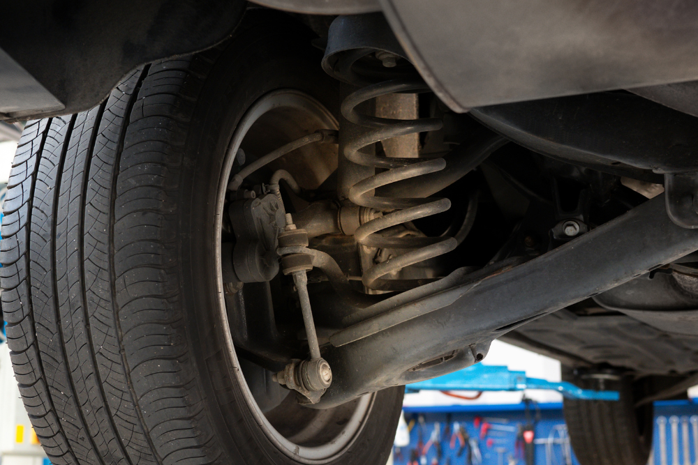 Suspension, Steering and Suspension Repair in Waupaca WI At Little Wolf . Car raised on lift for suspension repair service